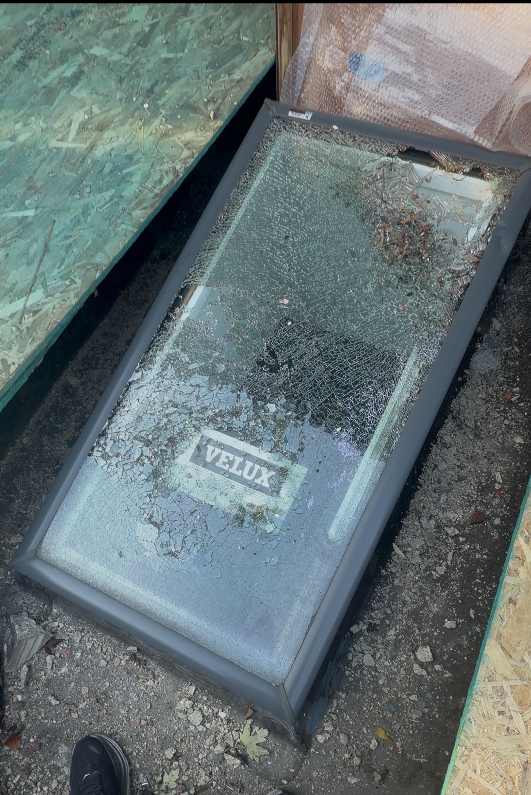 Cracked skylight before, and the new skylights after the replacement at a Des Plaines home (Before)