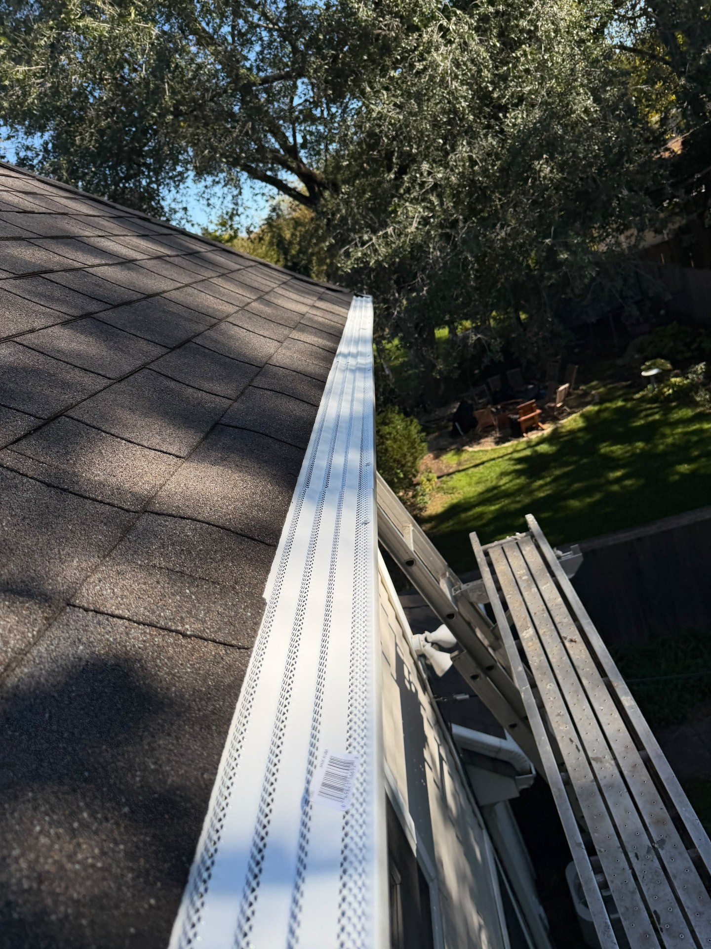 Two-story Evanston home gutters before and after gutter guards were installed (After)