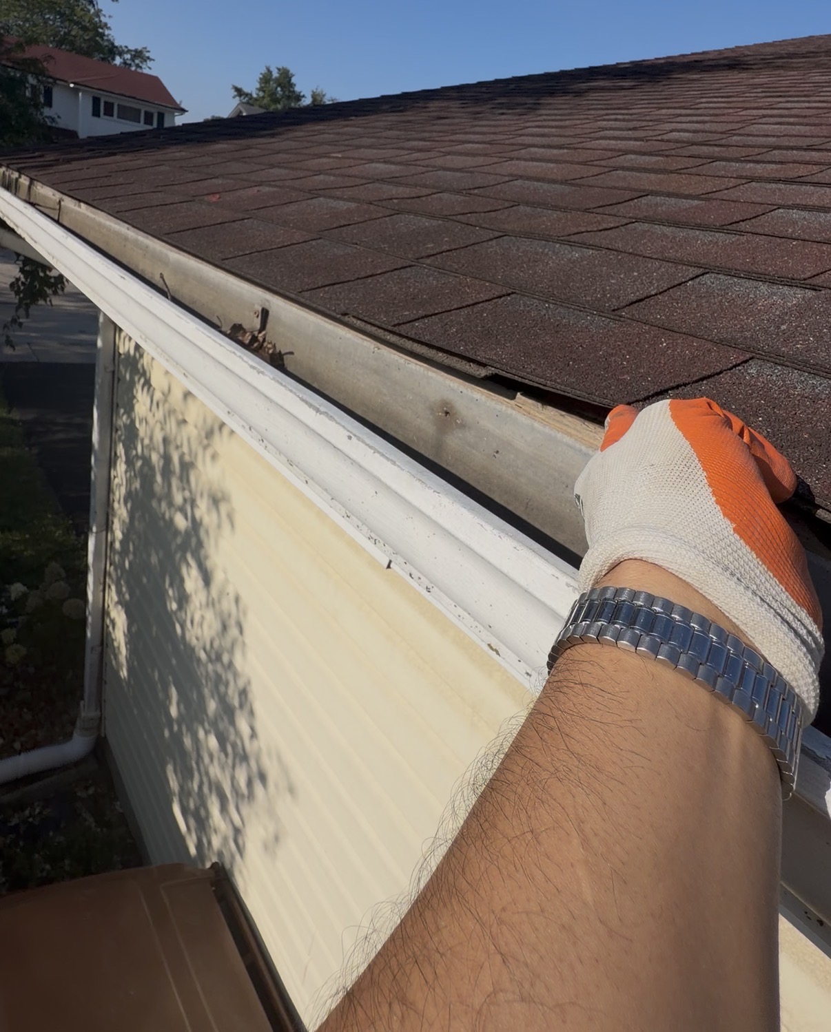 House gutter and fascia before and after the missing gutter apron was installed (Before)
