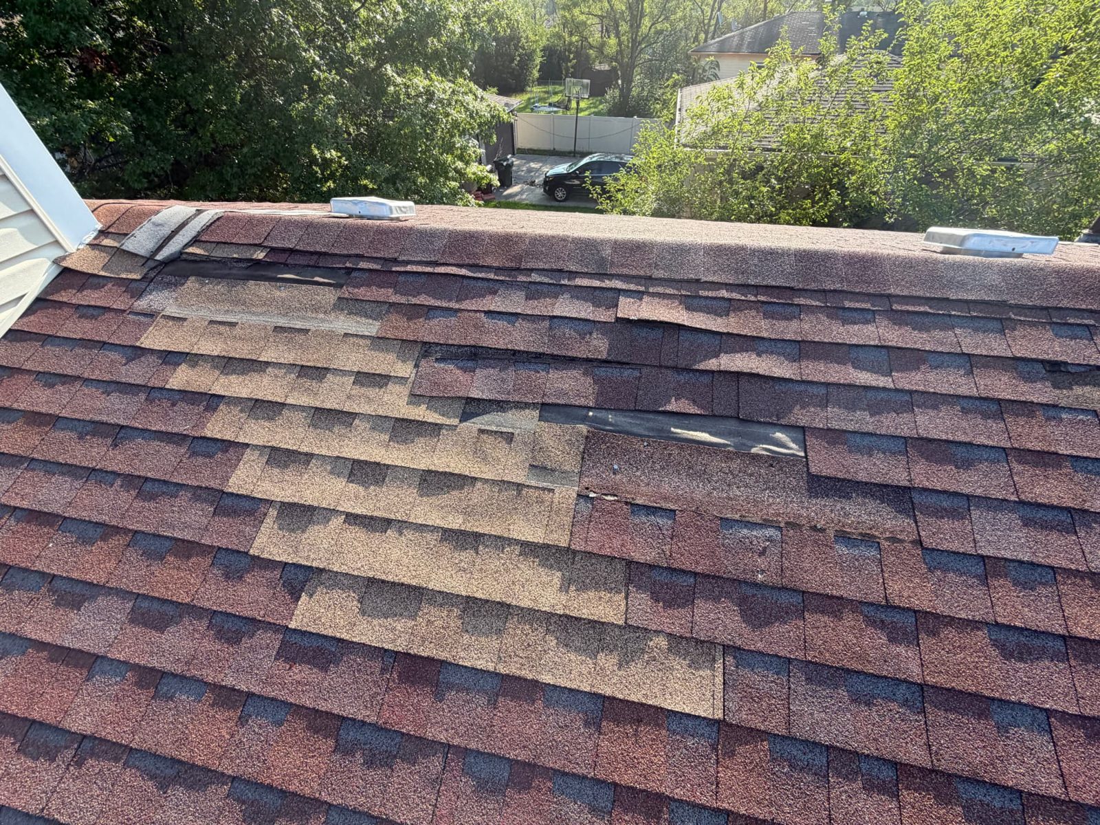 Shingle roof in Skokie before and after a small repair (Before)